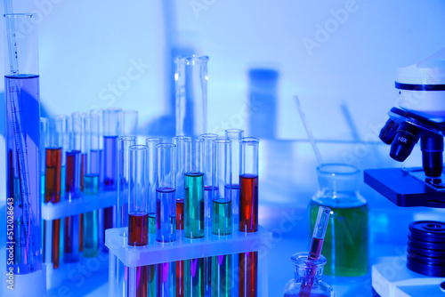 Laboratory glassware on blu...