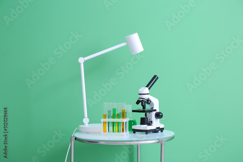 Modern microscope, lamp and...
