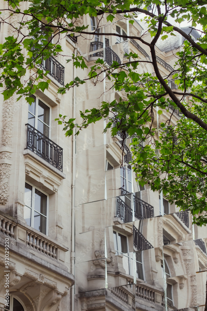 An image of a building behind trees An image of a building behind trees