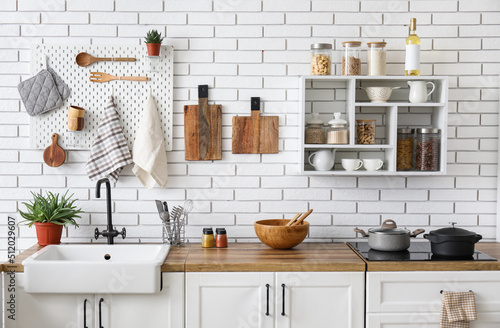 Kitchen counters with utens...