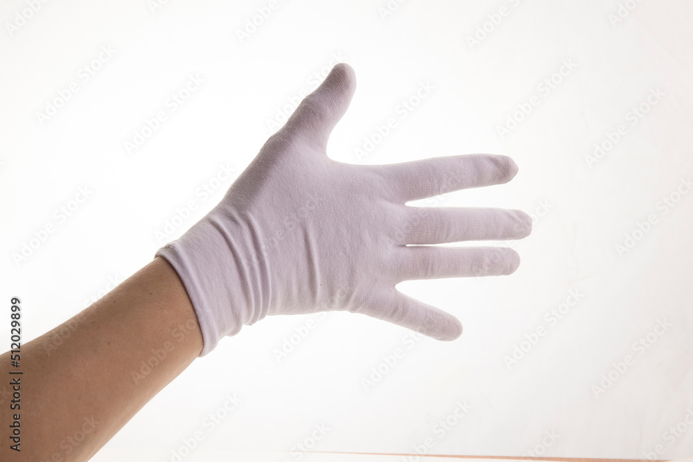 Hands gesticulating in white textile gloves on a white background