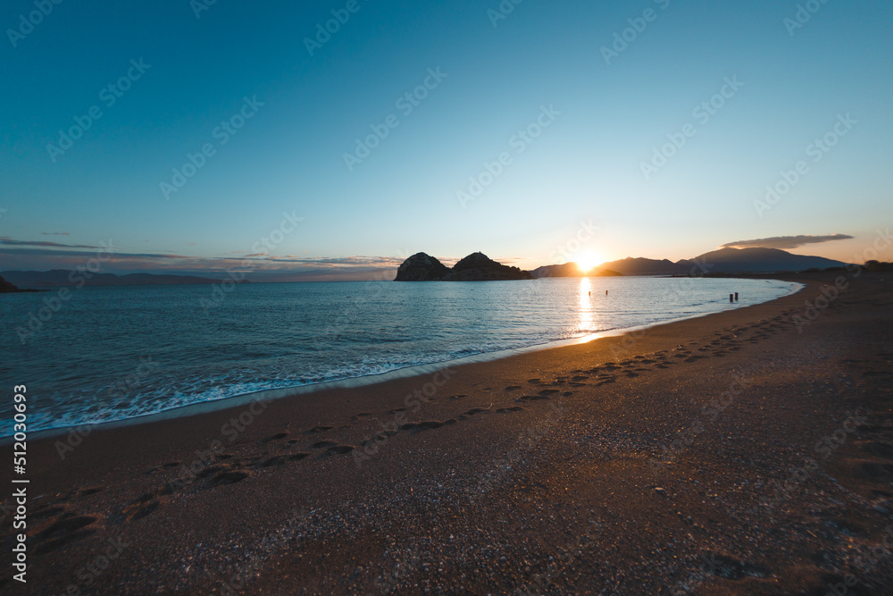 A beautiful seascape, a beach in the sunset light