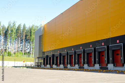 Large distribution warehouse with gates for loading goods.