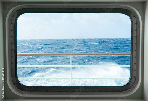 View from a cabin window of a cruise ship on the stormy sea