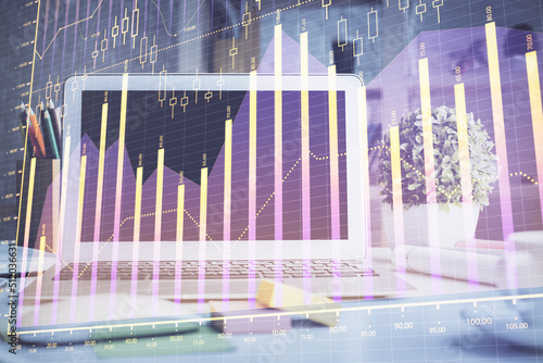 Stock market graph and table with computer background. Multi exposure. Concept of financial analysis. © peshkova