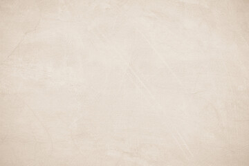 Old concrete wall texture background. Close up retro plain beige color cement material surface rough.