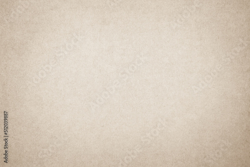 Brown recycled craft paper texture background. Cream cardboard texture, Old vintage page or grunge vignette. Pattern rough art creased grunge letter. 