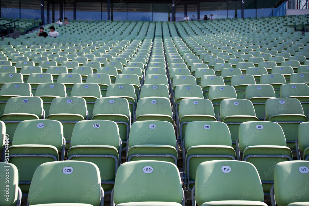 Naklejka premium Empty Plastic Chairs at the Stadium