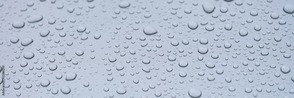 Condensation drops on a gray background, rain Condensation drops on a gray background, rain