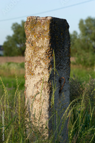 old concrete pillar field