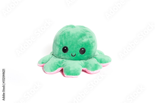 Plush green Octopus Toy Isolated on White. 