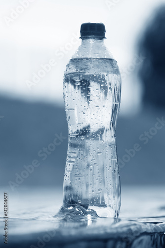 bottle of water in blue tones