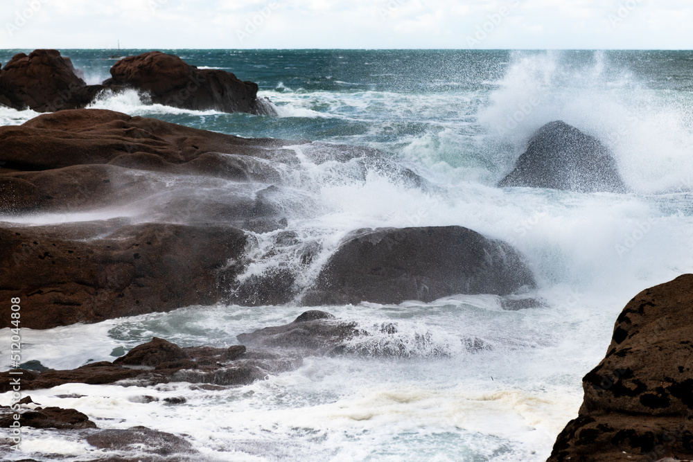 Fototapeta premium Rough sea and big waves hit rocks in northern France.
