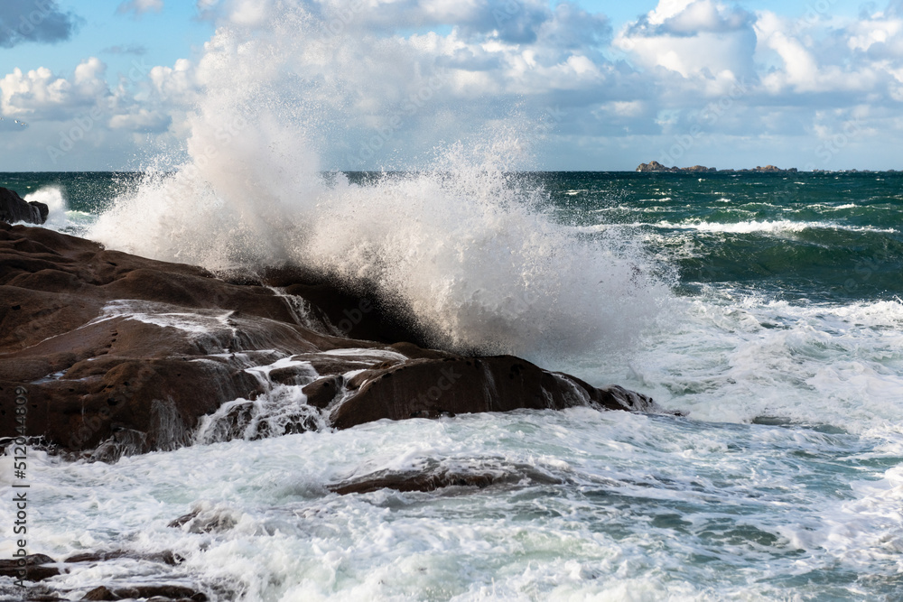 Rough sea and big waves hit rocks in northern France.