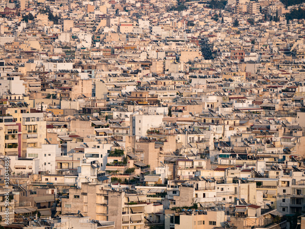 Views of Athens' dense city scape seen from Acropolis hill during sunset (horizontal)