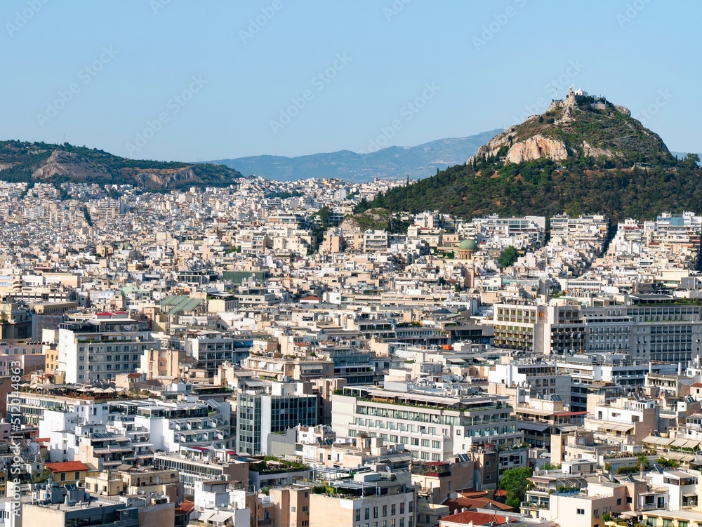 Panorama of Athens, Greece on a during golden hour with views on Philopappos Hill