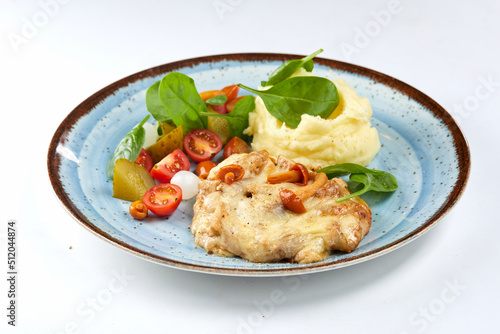 pork with mashed potato and vegetables