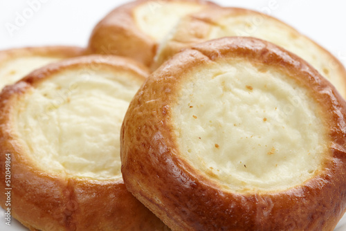 baked sweet buns on the white plate