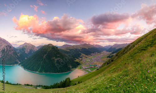 Livigno and lake at sunset, Livigno Valley, Valtellina, Lombardy, Italy photo