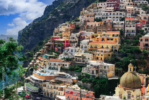 Positano town hill view with low rise colorful buildings above the sea line, Positano, Amalfi Coast, UNESCO World Heritage Site, Campania, Italy photo
