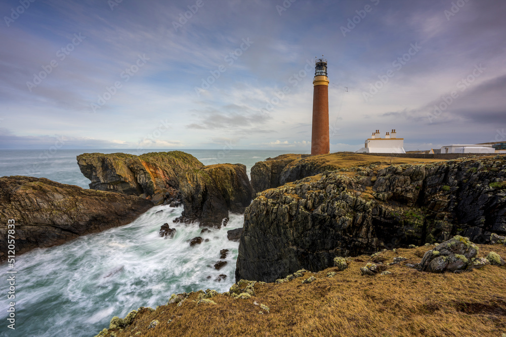 Butt of Lewis Lighthouse with rugged coastline, Isle of Lewis, Outer Hebrides, Scotland Butt of Lewis Lighthouse with rugged coastline, Isle of Lewis, Outer Hebrides, Scotland