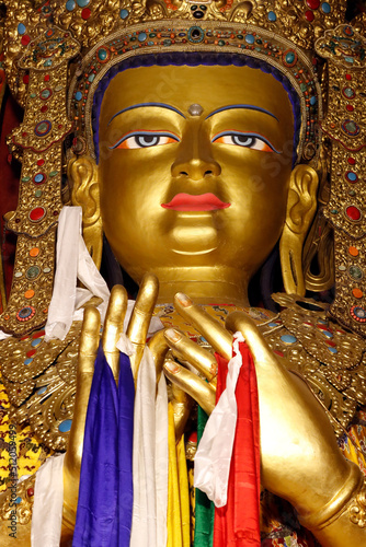 Golden Sakyamuni Buddha in a cloister prayer hall, Kathmandu, Nepal photo