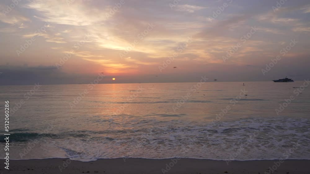 morning beach routine on sunrise sky with seagulls ship and person on sup board, cloudscape morning beach routine on sunrise sky with seagulls ship and person on sup board, cloudscape
