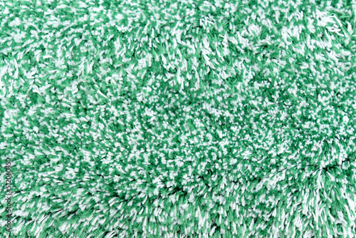 Texture of green Cloth Fabric. Garment Factory. Textile Production. Polyester. Close up