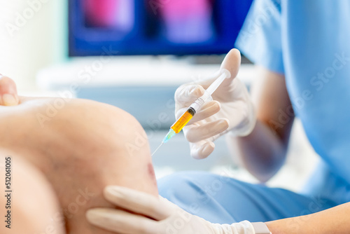 doctor make injection in knee