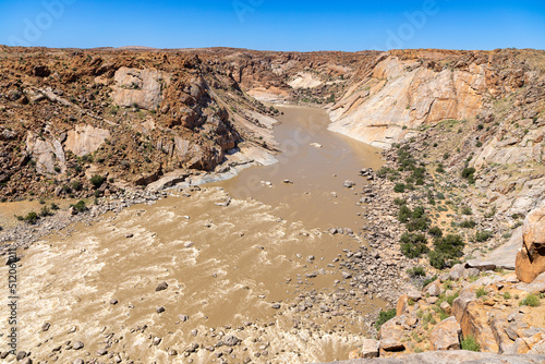 The Oranje river flowing in the Augrabies National Park.  The area is known as the Oranjekom. photo