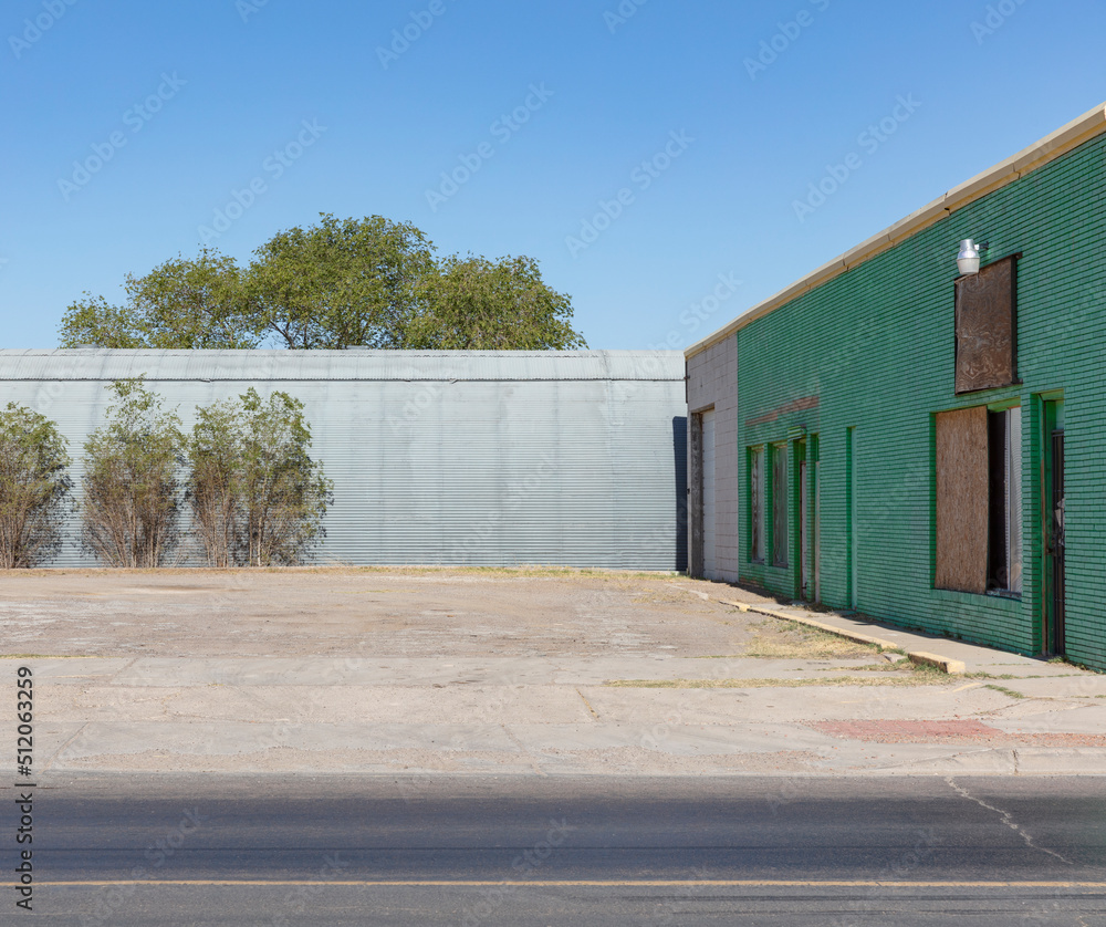 Abandoned warehouse and buildings with plants growing on the walls. Abandoned warehouse and buildings with plants growing on the walls.