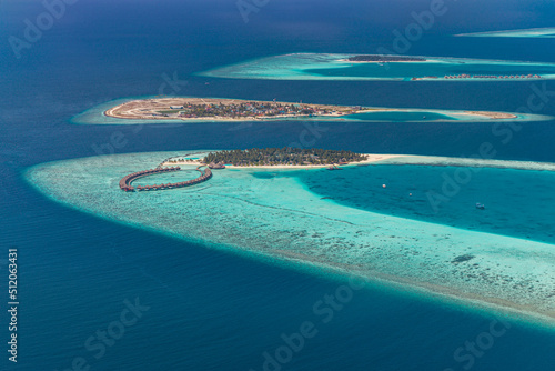 Beautiful Maldives paradise beach. Tropical aerial landscape, seascape with water villas bungalows on amazing sea lagoon beach, tropical nature. Exotic tourism destination, luxury summer vacation