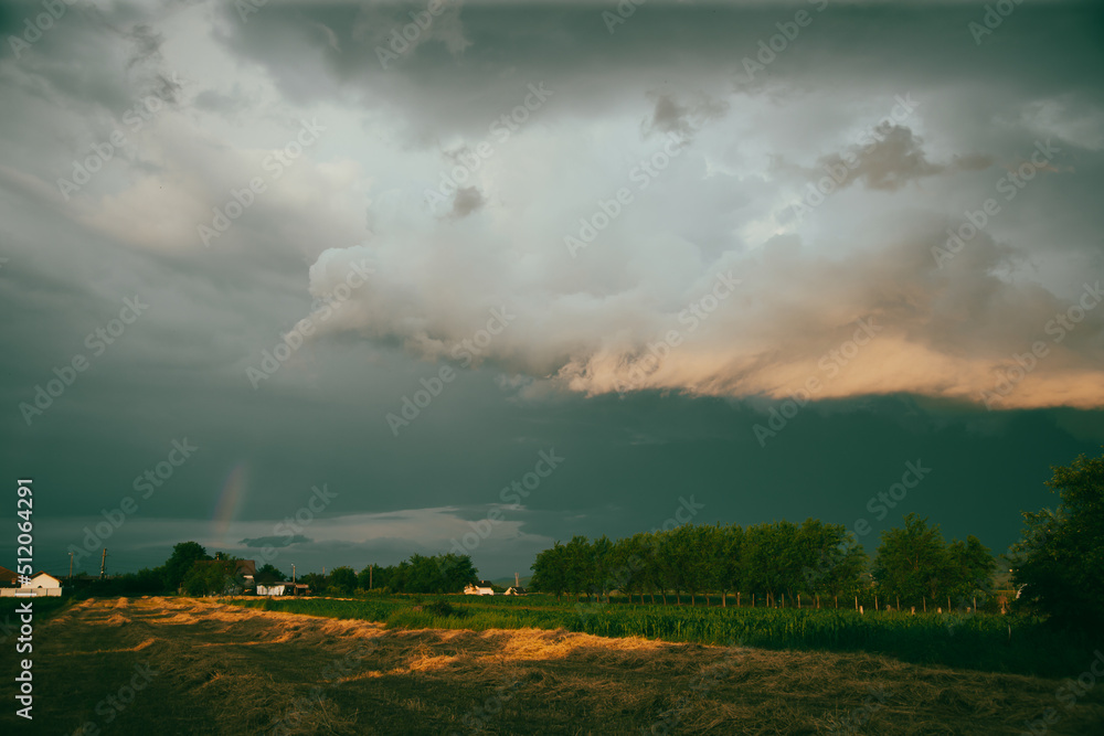 Dramatic sky with thunderstom over small village in Transylvania. Dramatic sky with thunderstom over small village in Transylvania.