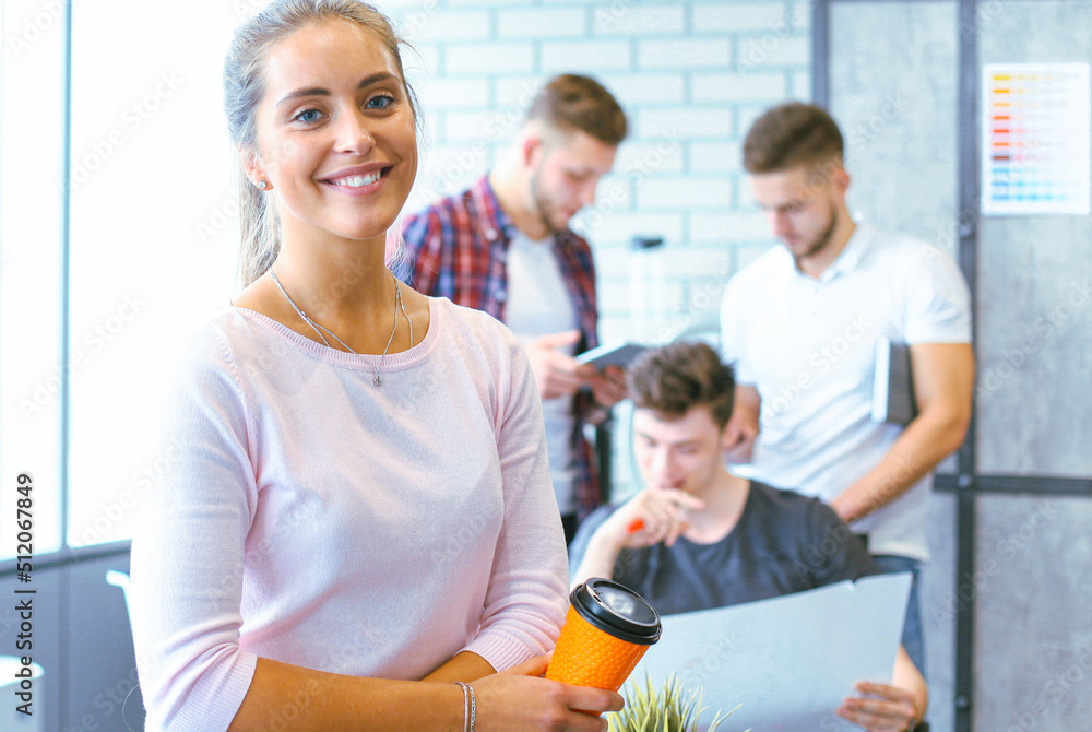 Fototapeta premium Beautiful young designers are working in office