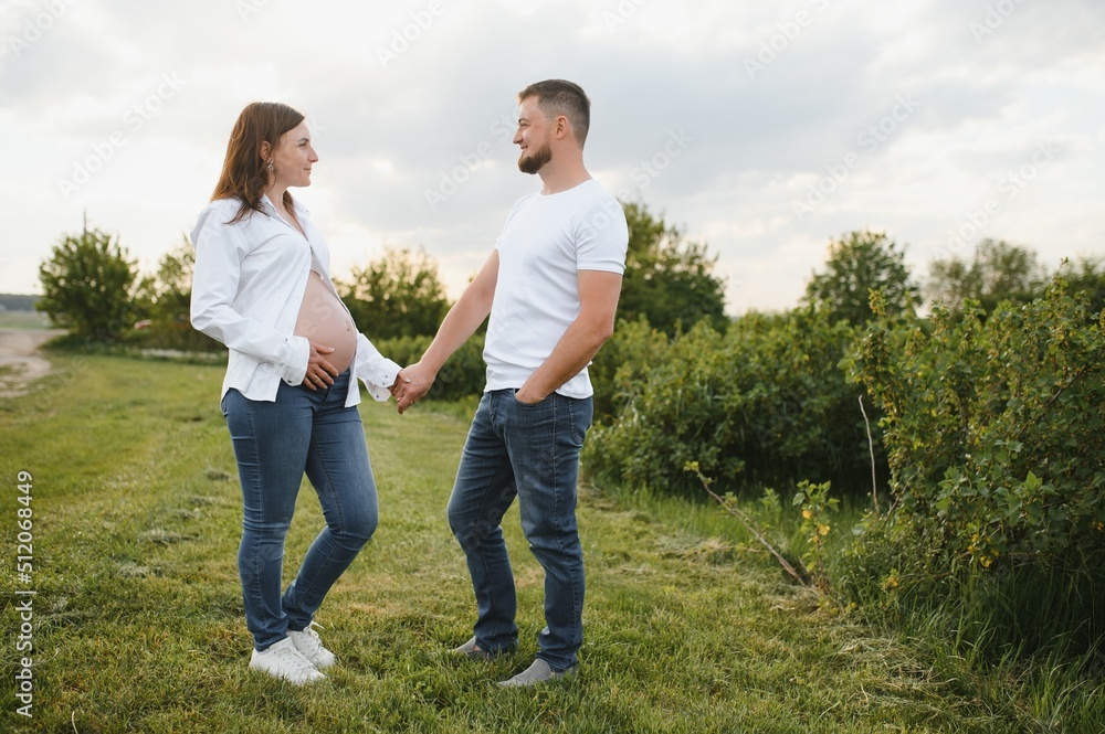 Portrait of lovely future parents during sunset Portrait of lovely future parents during sunset