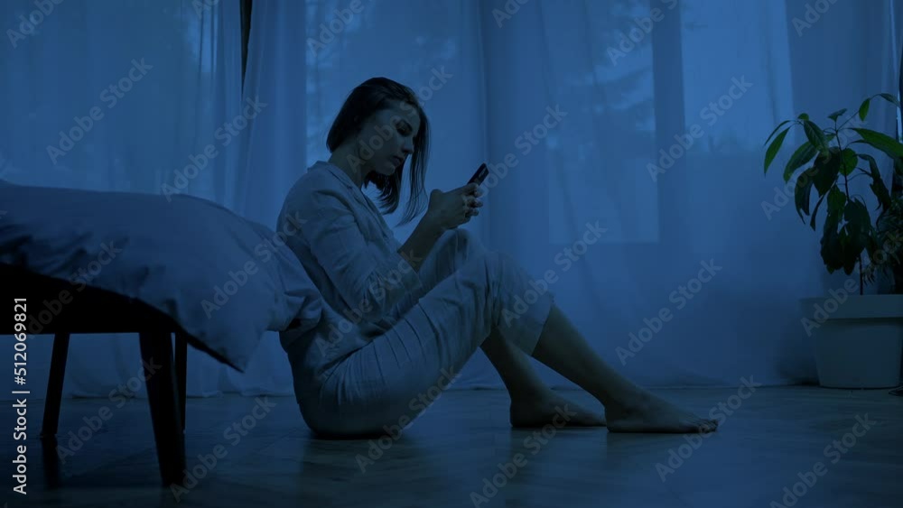 Upset woman waits for message from husband feeling worried Upset woman waits for message from husband feeling worried