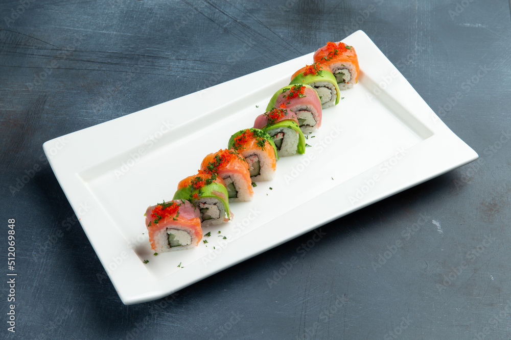 Rolls with avocado, salmon and rice. Rolls with avocado, salmon and rice.