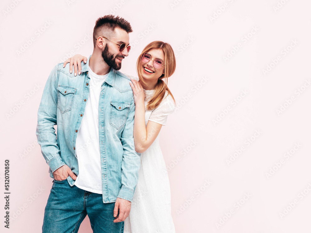 Sexy smiling beautiful woman and her handsome boyfriend. Happy cheerful family having tender moments near blue wall in studio.Pure cheerful models hugging.Embracing each other. Cheerful and happy Sexy smiling beautiful woman and her handsome boyfriend. Happy cheerful family having tender moments near blue wall in studio.Pure cheerful models hugging.Embracing each other. Cheerful and happy