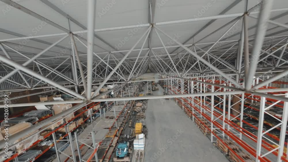 Drone tracking top view of industrial storage at daytime Drone tracking top view of industrial storage at daytime
