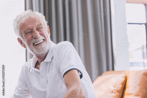 happy elderly man healthy senior confident smile with beautiful white teeth from denture prosthetics.