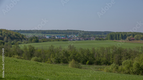 view of the village of Kalmash, Tatarstan, Russia, spring agricultural fields from the top of the hill on a spring clear morning