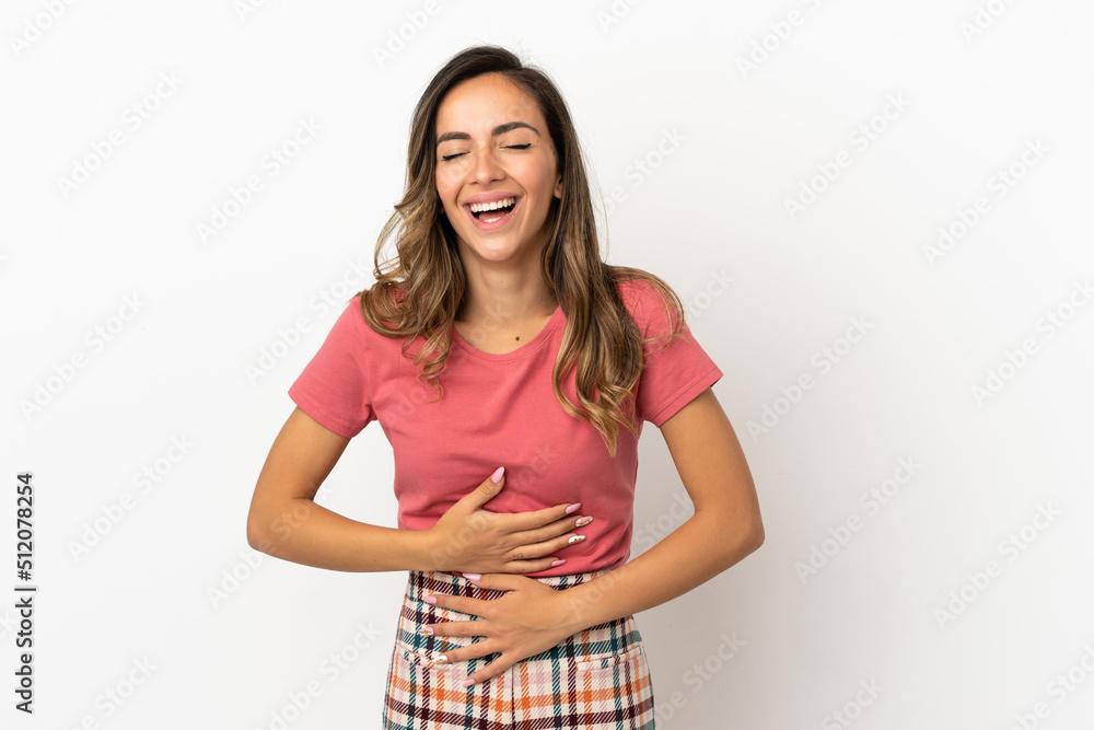 Young woman over isolated background smiling a lot Young woman over isolated background smiling a lot