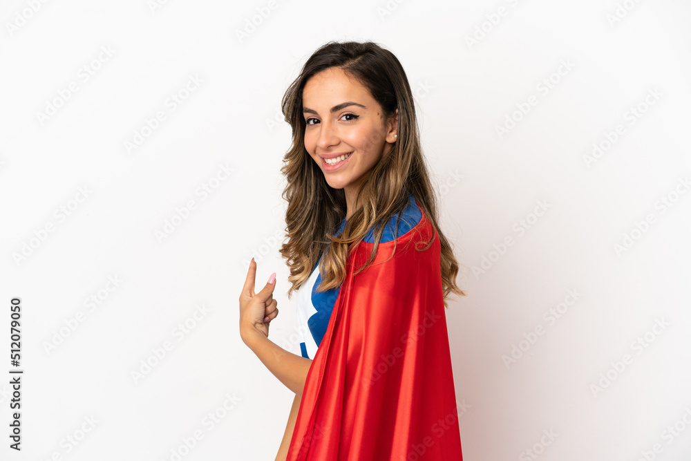 Super Hero woman over isolated white background pointing back Super Hero woman over isolated white background pointing back