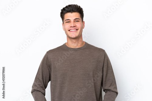 Young handsome caucasian man isolated on white bakcground laughing