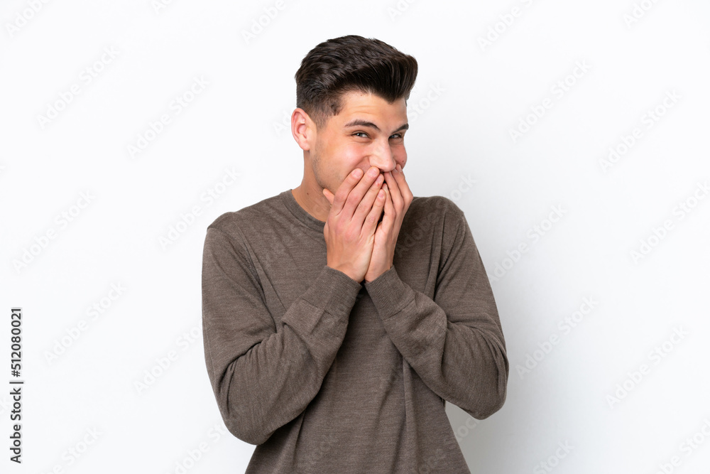 Young handsome caucasian man isolated on white bakcground happy and smiling covering mouth with hands Young handsome caucasian man isolated on white bakcground happy and smiling covering mouth with hands