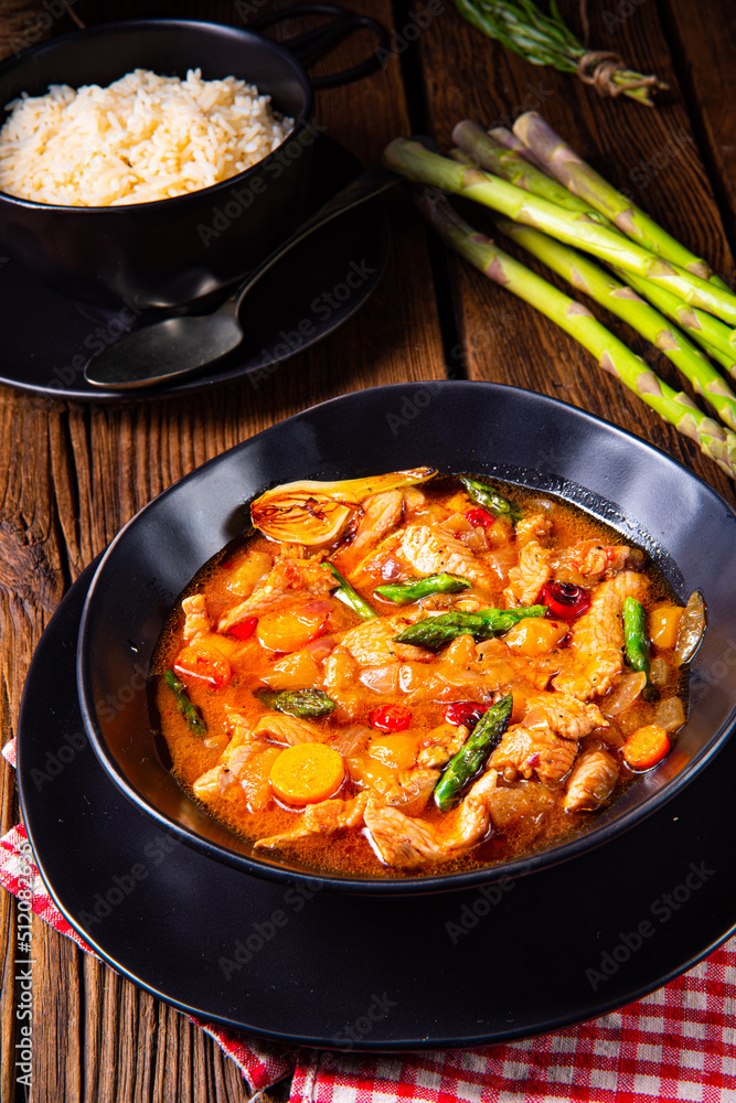 colorful turkey fricassee with asparagus and paprika colorful turkey fricassee with asparagus and paprika