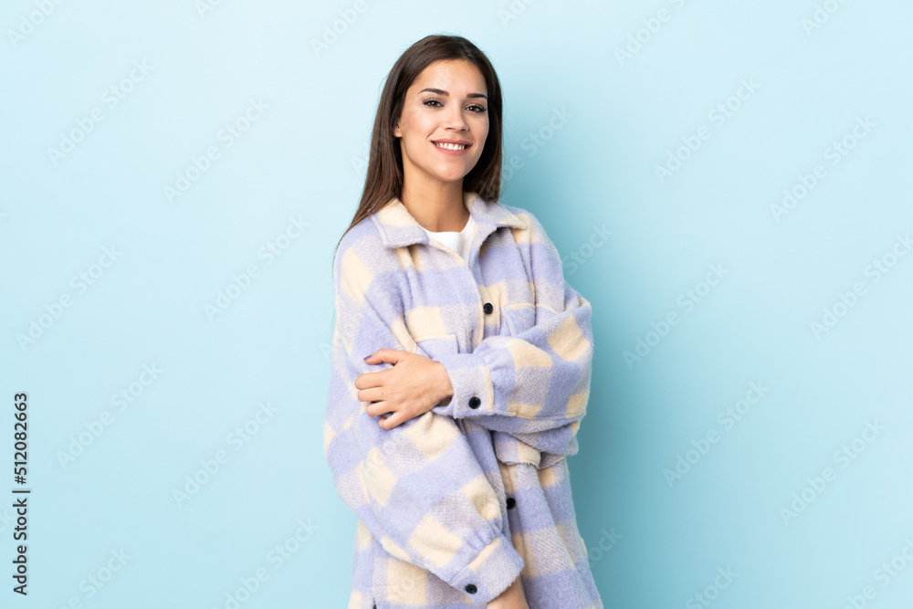 Young caucasian woman isolated on blue background laughing Young caucasian woman isolated on blue background laughing