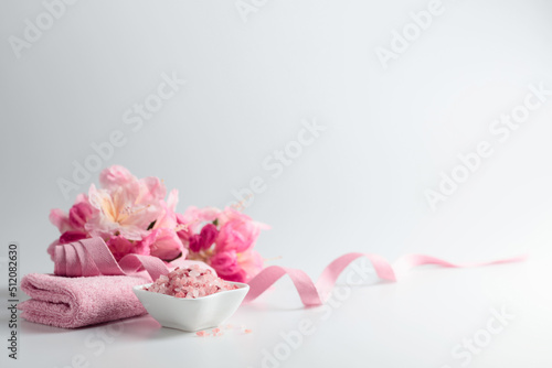 Spa composition with pink Himalayan salt.