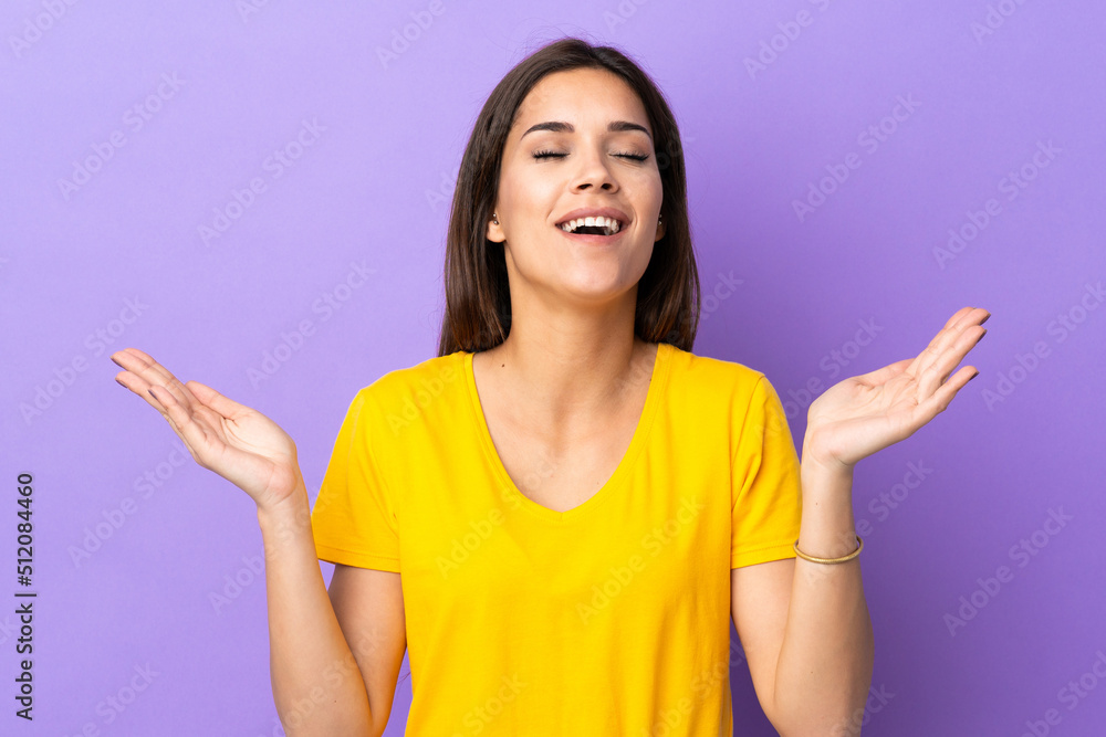 Young caucasian woman over isolated background smiling a lot Young caucasian woman over isolated background smiling a lot