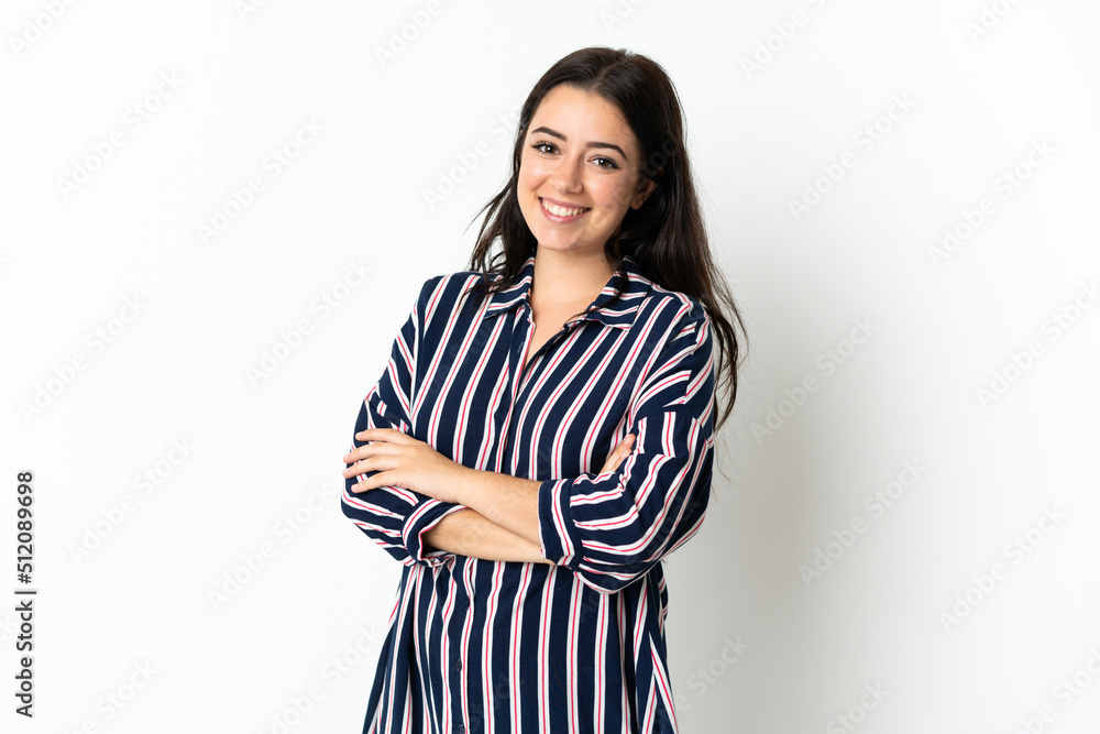 Young caucasian woman over isolated background keeping the arms crossed in frontal position Young caucasian woman over isolated background keeping the arms crossed in frontal position